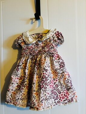 cupcakes & cashmere Cream Floral Smocked Dress with Pink and Purple Blooms